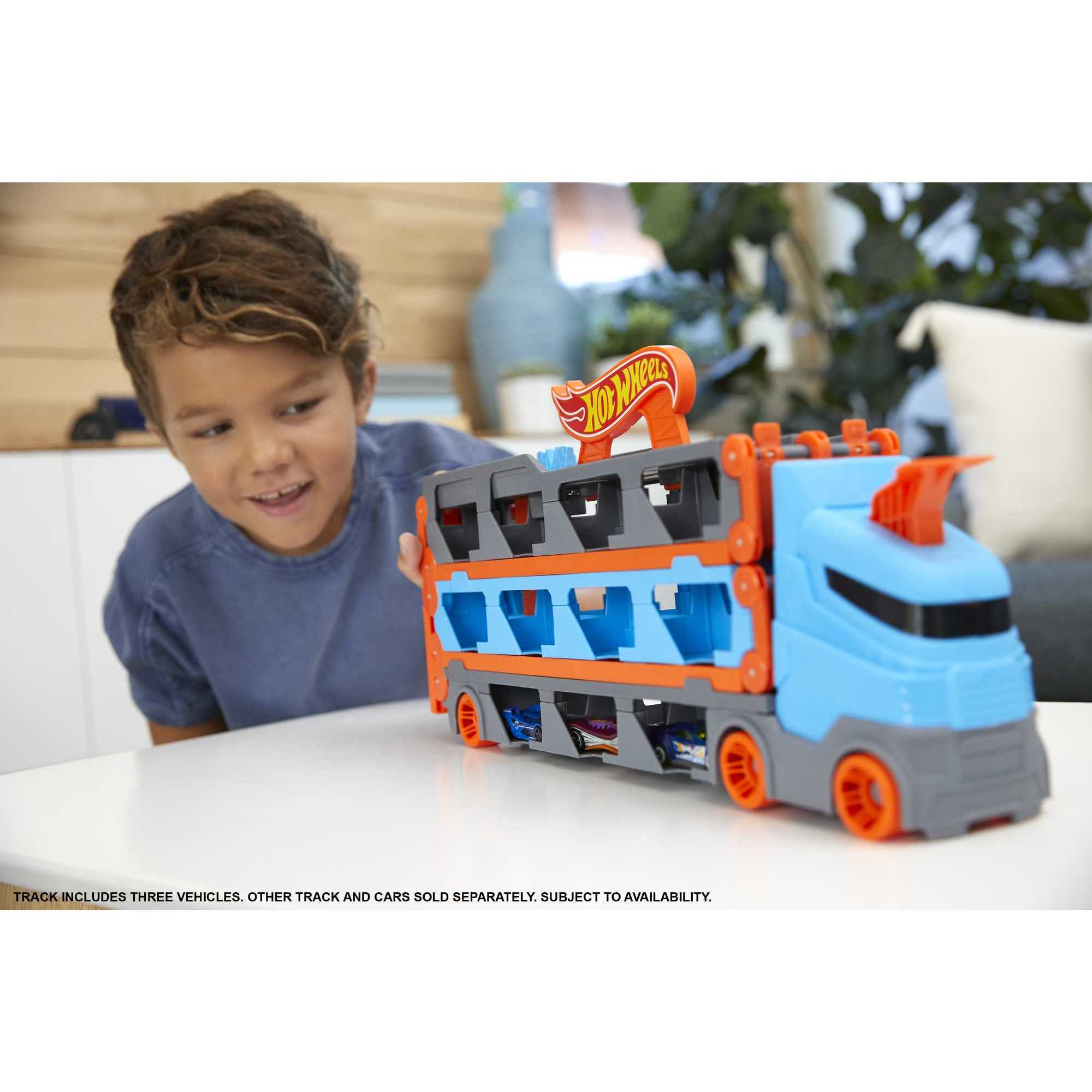 Hot Wheels Camión de transporte convertible en pista para coches de juguete - Image 2