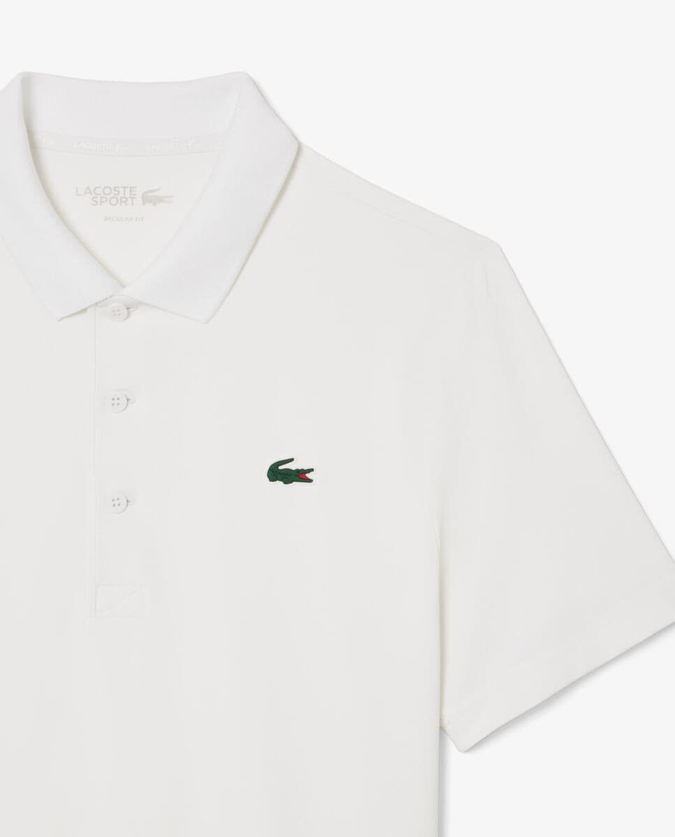 Lacoste - Polo de hombre de golf de corte regular con protección uv de manga corta. - Image 1
