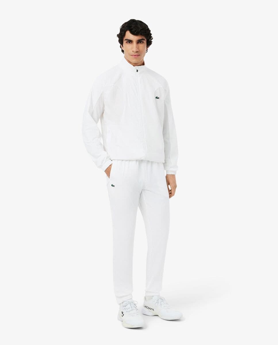 Lacoste - Chándal de hombre de tenis hidrófugo en bleu marine - noir. - Image 2
