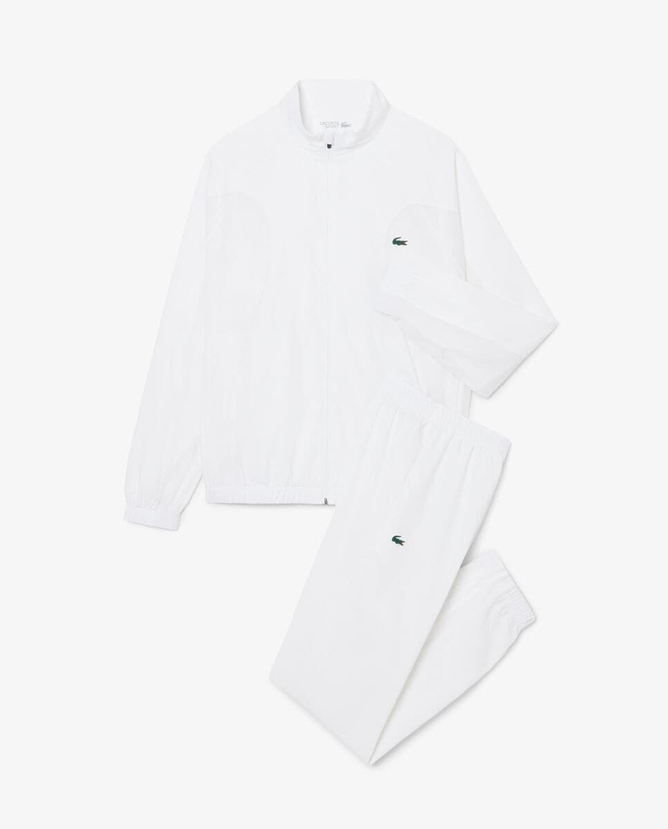 Lacoste - Chándal de hombre de tenis hidrófugo en bleu marine - noir. - Image 1