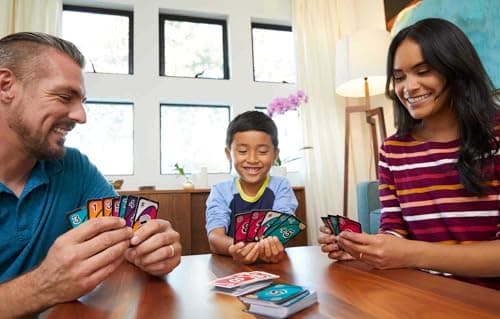 Uno GDG37 Card Game with 112 Cards in a Sturdy Metal Box, with Amazing New Action Cards, Adults, Children, Teenagers, Ages 7 and Above - Image 4