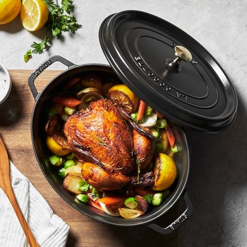 STAUB Enamelled Cast Iron Casserole Dish with Lid, Suitable for All Heat Sources Including Induction, 6 to 7 People, Oval, 33 cm, 6.70 L, 8.2 kg, Matte Black - Image 6