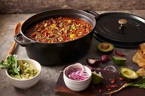 STAUB Enamelled Cast Iron Casserole Dish with Lid, Suitable for All Heat Sources Including Induction, 6 to 7 People, Oval, 33 cm, 6.70 L, 8.2 kg, Matte Black - Image 7