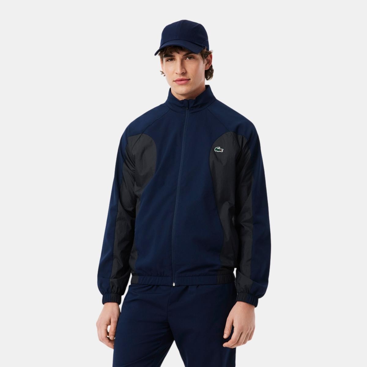 Lacoste - Chándal de hombre de tenis hidrófugo en bleu marine - noir. - Image 1